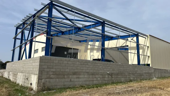 Přístavba skladovací haly pro zemědělskou techniku - Montáž opláštění